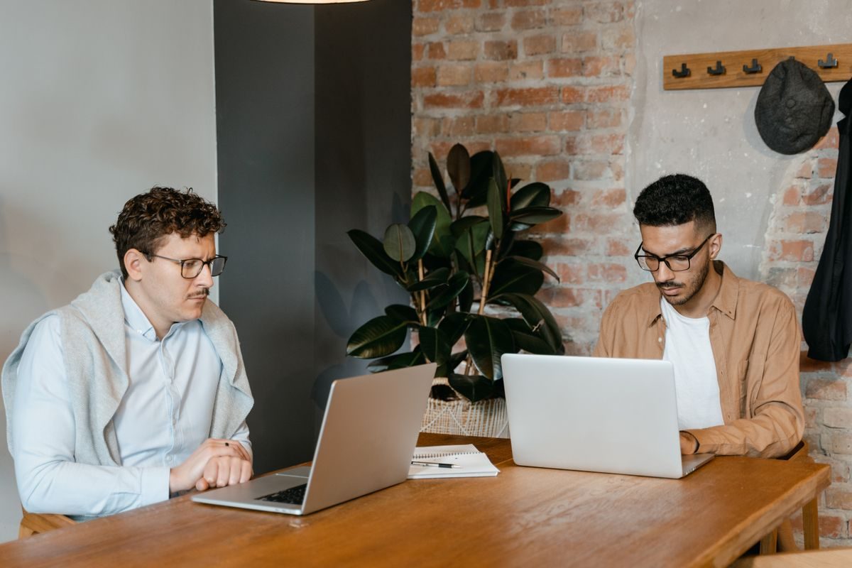 A small team sharing ideas at a desk